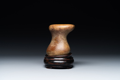 A Chinese scholar's rock on wooden stand, Ming or later