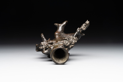 A Chinese bronze vase in the shape of a prunus, Ming