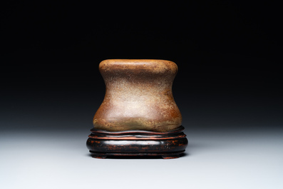 A Chinese scholar's rock on wooden stand, Ming or later