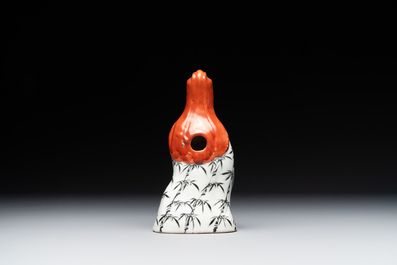 A Chinese famille rose Guanyin and a celadon-glazed dish, Chenghua mark, Qianlong/Jiaqing