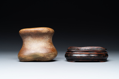 A Chinese scholar's rock on wooden stand, Ming or later