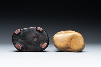 A Chinese scholar's rock on wooden stand, Ming or later