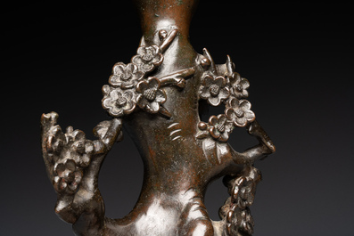 A Chinese bronze vase in the shape of a prunus, Ming