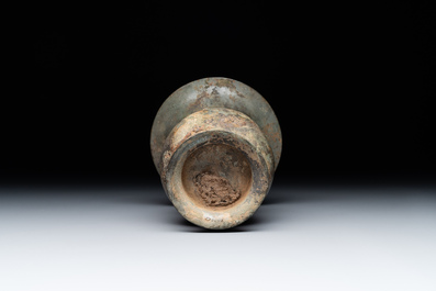 A Chinese archaic bronze ritual wine vessel with buffalo heads, 'zhi 觯', Western Zhou