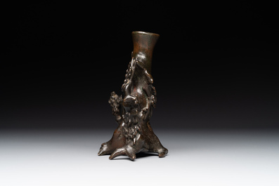 A Chinese bronze vase in the shape of a prunus, Ming