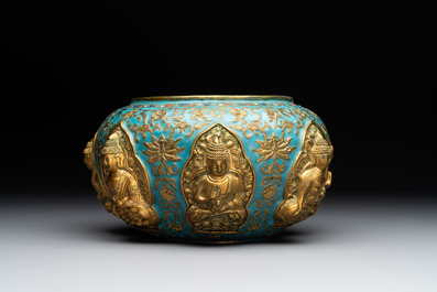 A Chinese gilt and champlev&eacute; enamelled bronze bowl with Buddhas in relief, 19/20th C.