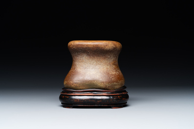 A Chinese scholar's rock on wooden stand, Ming or later