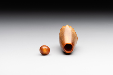 A rare Chinese rhinoceros horn snuff bottle in the shape of a Buddha hand, 19th C.