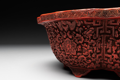 A Chinese red cinnabar lacquer jardiniere with floral design, Yongzheng/Qianlong