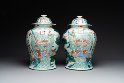 A pair of Chinese famille rose 'hundred boys' vases and covers on wooden stands, 19th C.