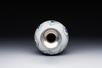 A Chinese blue and white silver-mounted vase with floral design, Kangxi