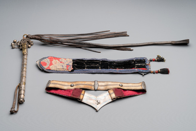 A gold lame woman's belt, a breast ornament and a silver karwat, Caucasus and Afghanistan, 19th C.