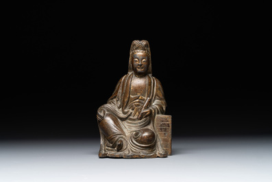 A rare Chinese parcel-gilt and lacquered pewter Guanyin, 17/18th C.