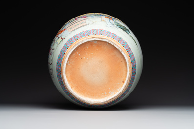 A Chinese famille rose jardiniere with ladies in a garden, 20th C.