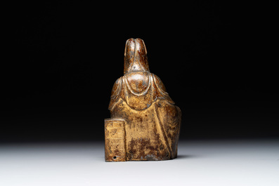 A rare Chinese parcel-gilt and lacquered pewter Guanyin, 17/18th C.