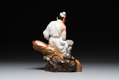 A Chinese polychrome sculpture of a lumberjack, Jingdezheng mark, 20th C.