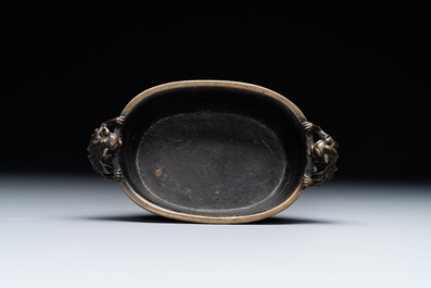 A rare Chinese bronze narcissus basin-shaped censer with dragon handles, Xuande mark, 17th C.