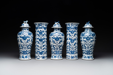 A Chinese blue and white garniture of five vases with lotus scrolls, 19th C.