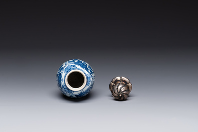 A Chinese blue and white 'hunting scene' 'klapmuts' bowl and a vase with a silver cover, Kangxi