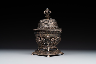 A varied collection of Chinese and Japanese eating set trousses, a Tibetan 'kapala' and two daggers, 18/19th C.