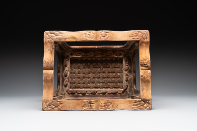 A Chinese rectangular huanghuali wooden stool with 'chilong' design, 17/18th C.