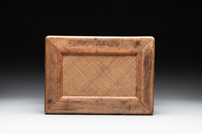 A Chinese rectangular huanghuali wooden stool with 'chilong' design, 17/18th C.