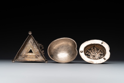 A varied collection of Chinese and Japanese eating set trousses, a Tibetan 'kapala' and two daggers, 18/19th C.