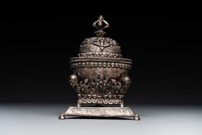 A varied collection of Chinese and Japanese eating set trousses, a Tibetan 'kapala' and two daggers, 18/19th C.