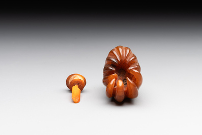 A rare Chinese rhinoceros horn snuff bottle in the shape of a Buddha hand, 19th C.