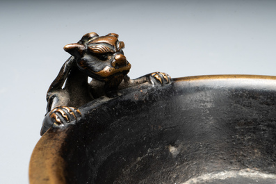 A rare Chinese bronze narcissus basin-shaped censer with dragon handles, Xuande mark, 17th C.