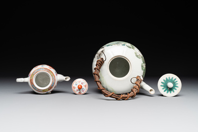 Two Chinese famille rose vases, two teapots and a Japanese wucai ewer, 19th C.