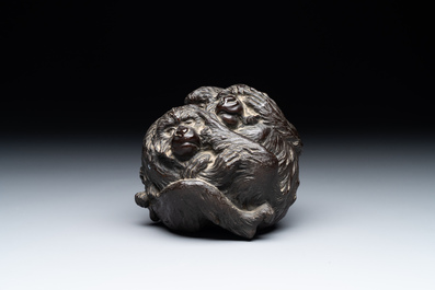 A Japanese bronze okimono with three monkeys, Yoshinobu seal mark, Meiji period