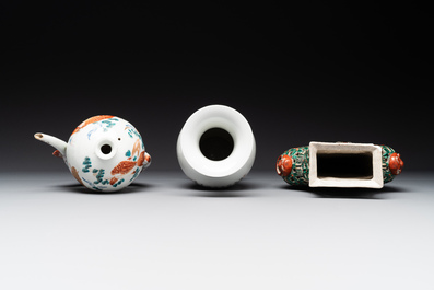 Two Chinese famille rose vases, two teapots and a Japanese wucai ewer, 19th C.