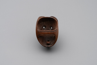 A Japanese lacquerware inro with a bird-shaped netsuke, a wooden 'fox' mask and a silver box, Chang Jia Zhai 常嘉斋 mark, 19th C.