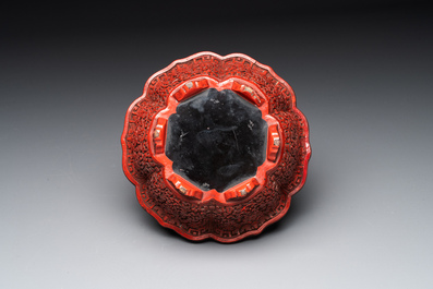 A Chinese red cinnabar lacquer jardiniere with floral design, Yongzheng/Qianlong