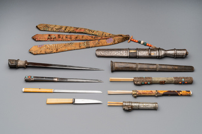 A varied collection of Chinese and Japanese eating set trousses, a Tibetan 'kapala' and two daggers, 18/19th C.