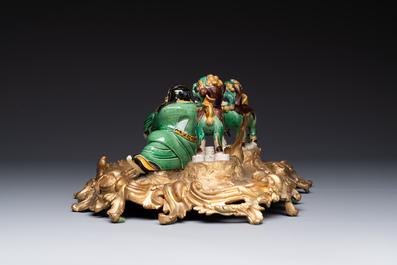 A French ormolu inkwell inset with Chinese verte biscuit porcelain, 19th C. and Kangxi