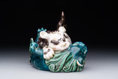 A Japanese polychrome-glazed group of playing Buddhist lions, 18/19th C.