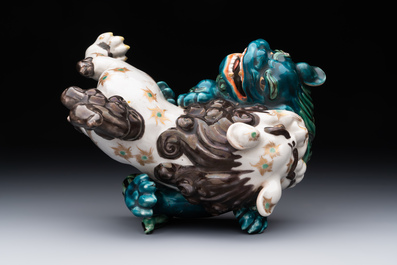 A Japanese polychrome-glazed group of playing Buddhist lions, 18/19th C.