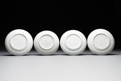 A large Chinese Canton famille rose dish and eight plates, 19th C.