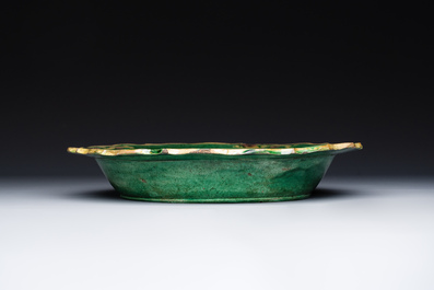 A Chinese sancai-glazed flower-shaped 'crane' plate, Ming