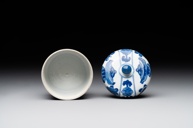 A Chinese blue and white vase, a covered bowl and six saucers, Chenghua and artemisia leaf mark, Kangxi