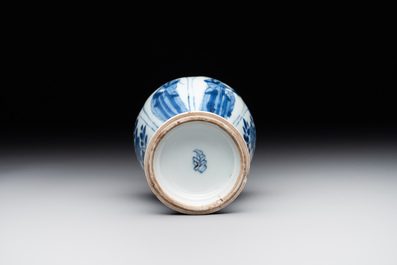 A Chinese blue and white vase, a covered bowl and six saucers, Chenghua and artemisia leaf mark, Kangxi