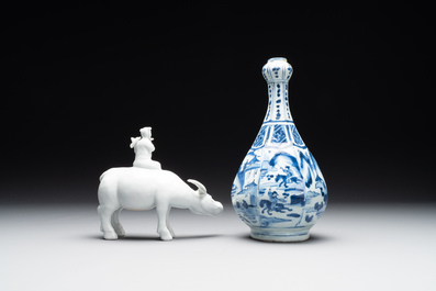 A Chinese blue and white garlic-mouth vase and a white glazed group of a boy on a buffalo, Wanli/Qianlong