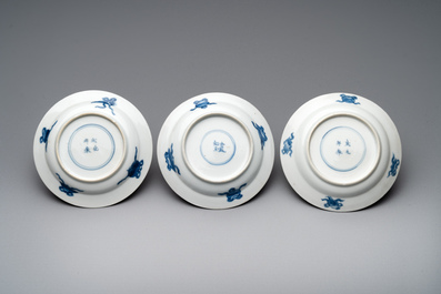 A Chinese blue and white vase, a covered bowl and six saucers, Chenghua and artemisia leaf mark, Kangxi