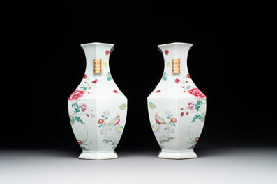 A pair of hexagonal Chinese famille rose 'hu' vases with floral design, Qianlong/Jiaqing