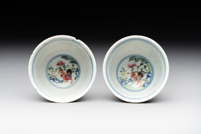 A pair of Chinese famille rose 'chicken' cups, Qianlong mark and of the period
