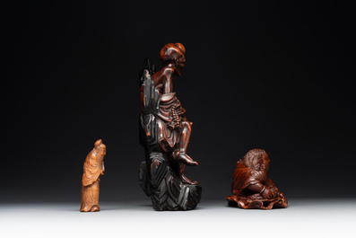 Two Chinese boxwood sculptures of Luohan and Liuhai and a bamboo sculpture of a sage, 17/19th C.
