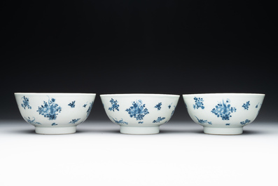 Six Chinese blue and white 'floral' bowls, a pair of dishes, a saucer and an iron-red-decorated plate, Qianlong