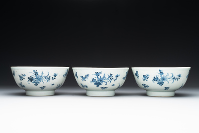 Six Chinese blue and white 'floral' bowls, a pair of dishes, a saucer and an iron-red-decorated plate, Qianlong